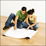 couple looking at blueprints